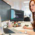 IT worker in front of a computer